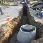 Pose de canalisations réseau EU et EP séparatif en tranchée ouverte lors de travaux d'assainissement en Essonne